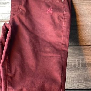 Dark red jeans yes they are mid rise skinny